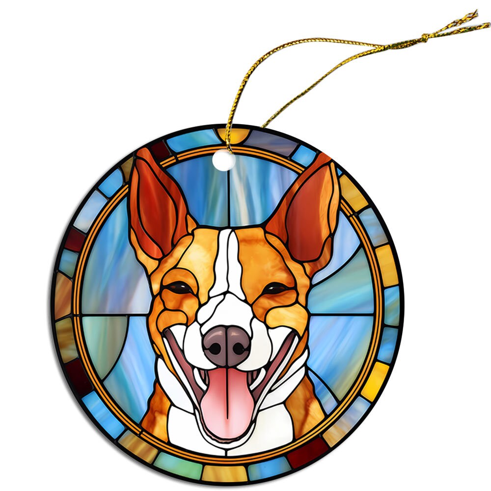 Stained glass style Christmas ornament featuring a Basenji dog breed design, with vibrant colors and an elegant golden string.